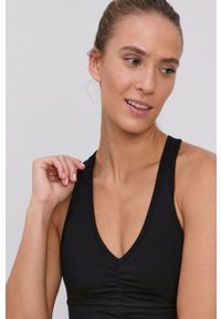 DKNY - Dkny Biustonosz kolor czarny gładki. Kolor: czarny. Rodzaj stanika: odpinane ramiączka. Wzór: gładki #3