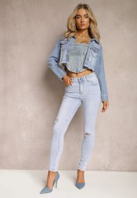 Renee - Jasnoniebieskie Jeansy Skinny z Drobnymi Przetarciami Ezivatia. Kolor: niebieski