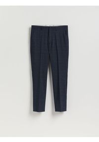 Reserved - Spodnie garniturowe slim fit - granatowy. Kolor: niebieski. Materiał: tkanina
