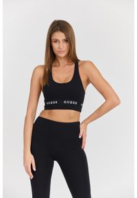 Guess - GUESS Damski czarny top Aline Eco Stretch Jersey. Okazja: na co dzień. Kolor: czarny. Materiał: jersey. Styl: casual #1