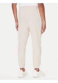 TOMMY HILFIGER - Tommy Hilfiger Spodnie dresowe UM0UM03664 Écru Regular Fit. Materiał: bawełna