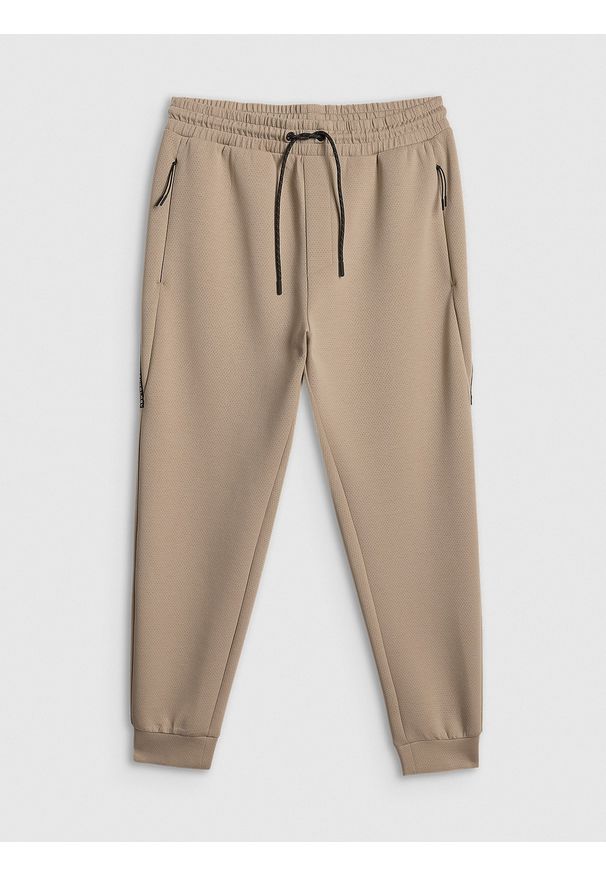 4f - 4F Spodnie dresowe joggery męskie - beżowe S. Kolor: beżowy. Materiał: dresówka. Sport: fitness