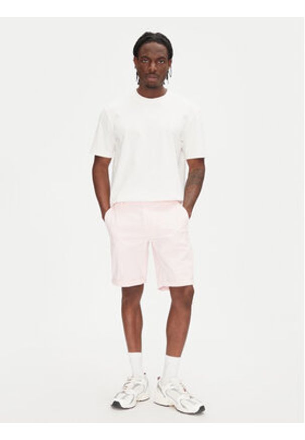 Tommy Jeans Szorty materiałowe Scanton DM0DM21950 Różowy Slim Fit. Kolor: różowy. Materiał: bawełna