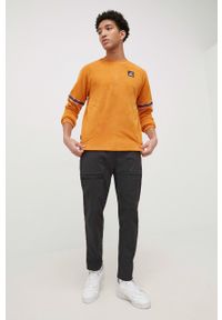 New Balance bluza MT13513MOE męska kolor pomarańczowy z aplikacją. Kolor: pomarańczowy. Materiał: dzianina. Wzór: aplikacja #2