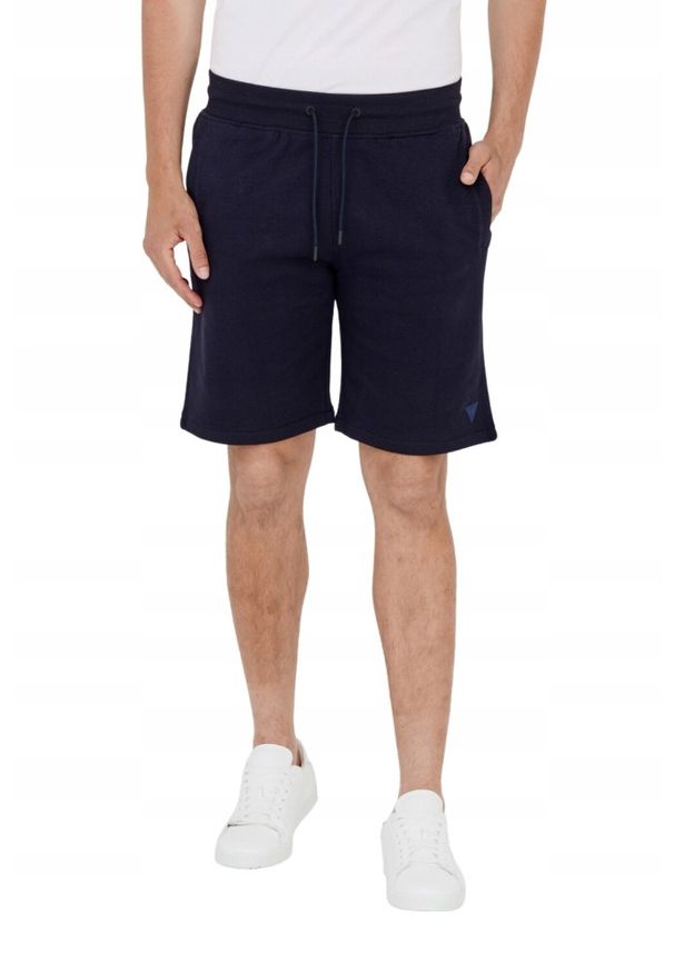 Guess - GUESS Granatowe dresowe szorty męskie. Kolor: niebieski. Materiał: bawełna