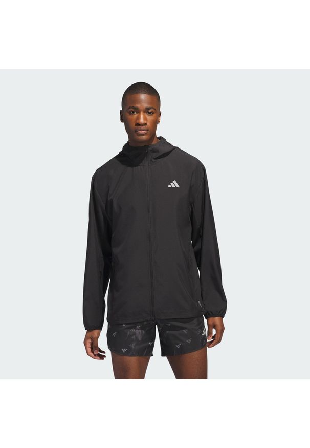 Adidas - Kurtka Run It. Kolor: czarny. Materiał: materiał. Sport: bieganie