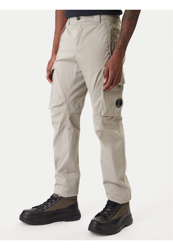 C.P. Company Spodnie materiałowe 20CMPA744A005694G Beżowy Regular Fit. Kolor: beżowy. Materiał: bawełna