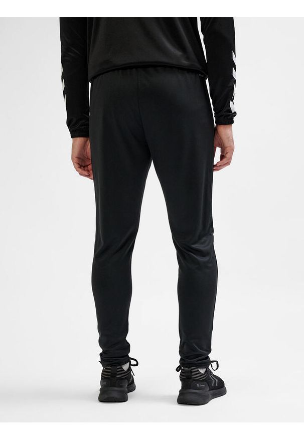 Hummel - SPODNIE hmlESSENTIAL TRAINING PANTS. Kolor: czarny. Materiał: dresówka