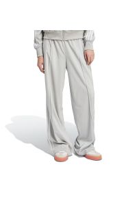 Adidas - Spodnie damskie adidas Adicolor Classic Firebird Loose JC8249 - szare. Kolor: szary. Materiał: poliester, dresówka, materiał, tkanina. Wzór: aplikacja, paski. Sezon: lato #1
