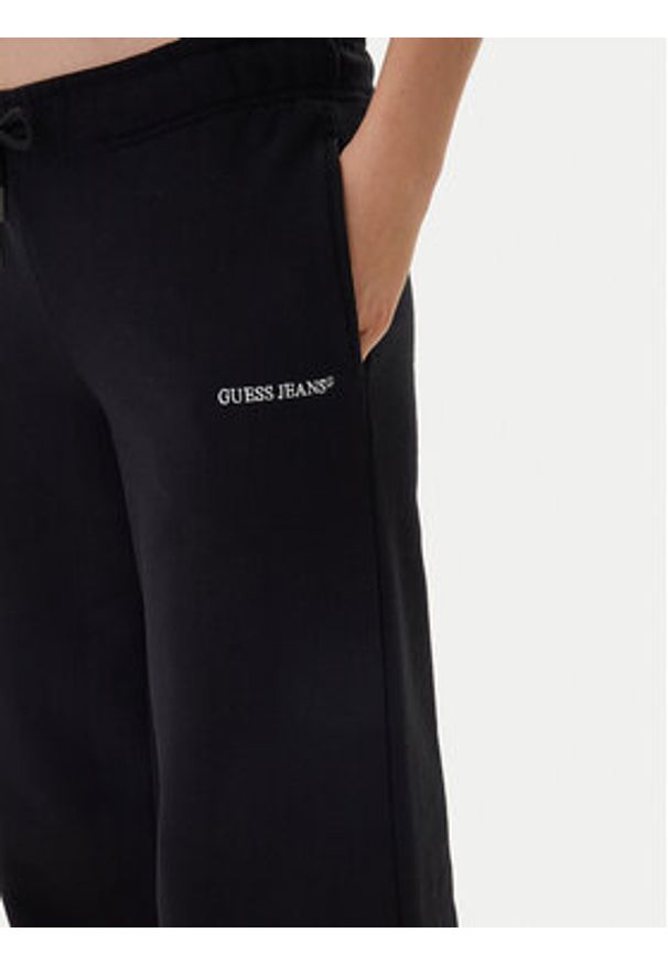 Guess Jeans Spodnie dresowe W6RB52 K68I4 Czarny Regular Fit. Kolor: czarny. Materiał: bawełna
