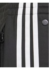 Adidas - adidas Spodnie dresowe Adibreak IM8431 Czarny Regular Fit. Kolor: czarny. Materiał: syntetyk #3