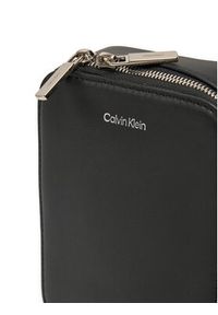 Calvin Klein Saszetka Ck Sleek Reporter Xs K50K512747 Czarny. Kolor: czarny. Materiał: skóra