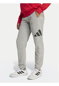 Adidas - adidas Spodnie dresowe Essentials JD2092 Szary Regular Fit. Kolor: szary. Materiał: bawełna #8