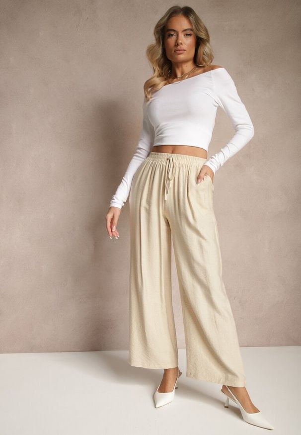 Renee - Beżowe Spodnie o Szerokim Kroju High Waist z Wiązaniem Fenalin. Okazja: na co dzień, na imprezę, na spacer. Stan: podwyższony. Kolor: beżowy. Styl: elegancki, casual