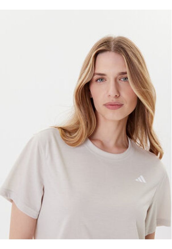 Adidas - adidas Koszulka techniczna Train Essentials JE6169 Beżowy Loose Fit. Kolor: beżowy. Materiał: syntetyk