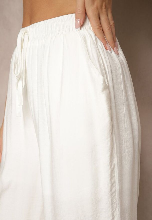 Renee - Białe Spodnie o Szerokim Kroju High Waist z Wiązaniem Fenalin. Okazja: na co dzień, na imprezę, na spacer. Stan: podwyższony. Kolor: biały. Styl: elegancki, casual