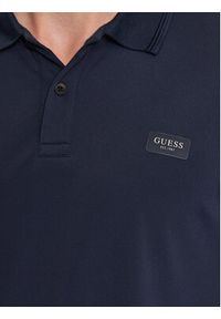 Guess Polo M3YP13 KBS60 Granatowy Slim Fit. Typ kołnierza: polo. Kolor: niebieski. Materiał: syntetyk