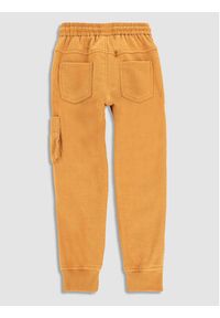COCCODRILLO - Coccodrillo Spodnie dresowe WC3119101DWK Żółty Slim Fit. Kolor: żółty. Materiał: bawełna #2