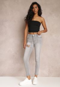Renee - Jasnoszare Jeansy Skinny Push-Up z Wycięciem i Cyrkoniami Idomara. Kolor: szary. Wzór: aplikacja