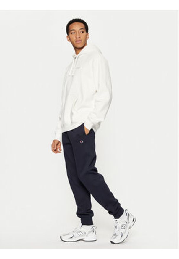 Champion Spodnie dresowe 220299 Granatowy Slim Fit. Kolor: niebieski. Materiał: bawełna, syntetyk