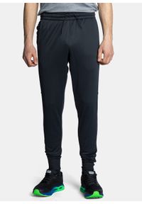Spodnie dresowe męskie czarne Under Armour Fleece. Kolor: czarny. Materiał: dresówka. Sport: fitness