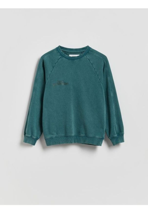 Reserved - Bluza oversize z efektem sprania - morski. Kolor: morski. Materiał: dzianina, bawełna