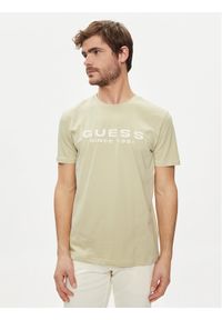 Guess T-Shirt M4GI61 J1314 Beżowy Slim Fit. Kolor: beżowy. Materiał: bawełna