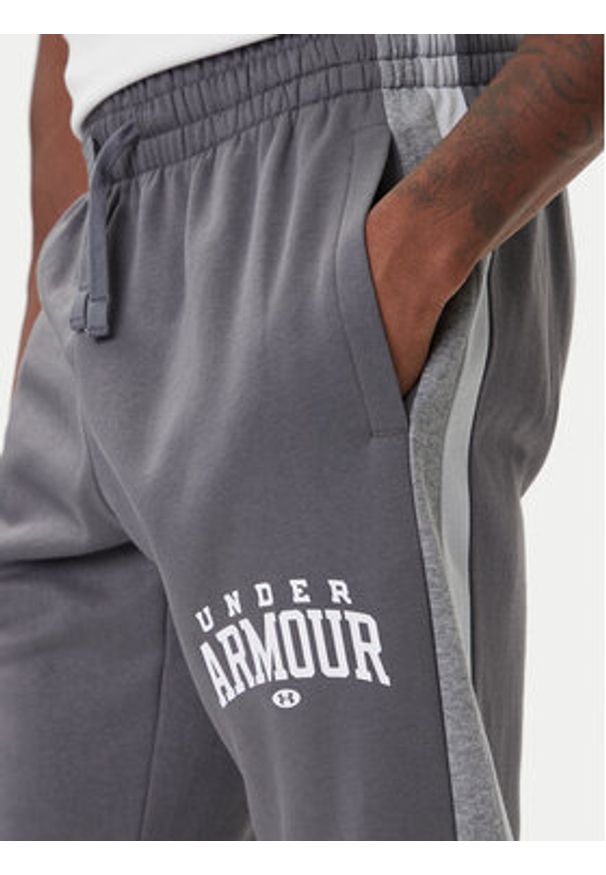 Under Armour Spodnie dresowe Ua Rival Fleece Colorblock 6003954 Szary Loose Fit. Kolor: szary. Materiał: bawełna
