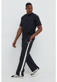 Fila spodnie dresowe męskie kolor czarny z aplikacją. Kolor: czarny. Materiał: dresówka. Wzór: aplikacja #3