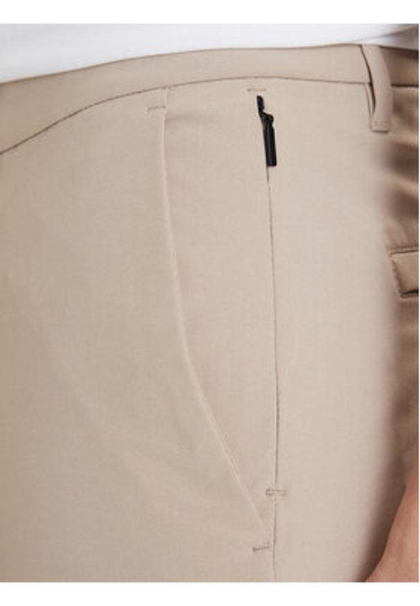 TOMMY HILFIGER - Tommy Hilfiger Chinosy Denton MW0MW43408 Beżowy Slim Fit. Kolor: beżowy. Materiał: syntetyk