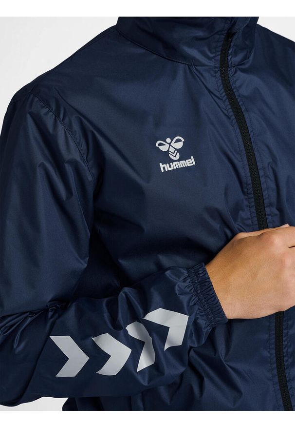 Kurtka ortalionowa piłkarska dla dorosłych Hummel Core XK Spray Jacket. Kolor: niebieski. Sport: piłka nożna
