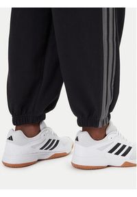 Adidas - adidas Spodnie dresowe Ess JM1703 Czarny Regular Fit. Kolor: czarny. Materiał: bawełna #5
