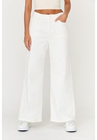 7 FOR ALL MANKIND Białe jeansy damskie Zoey Milk, Rozmiar 29. Kolor: biały. Styl: elegancki