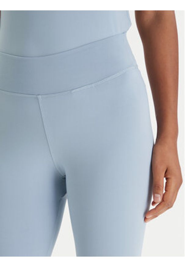 Guess Legginsy V6RB11 KD952 Niebieski Slim Fit. Kolor: niebieski. Materiał: syntetyk