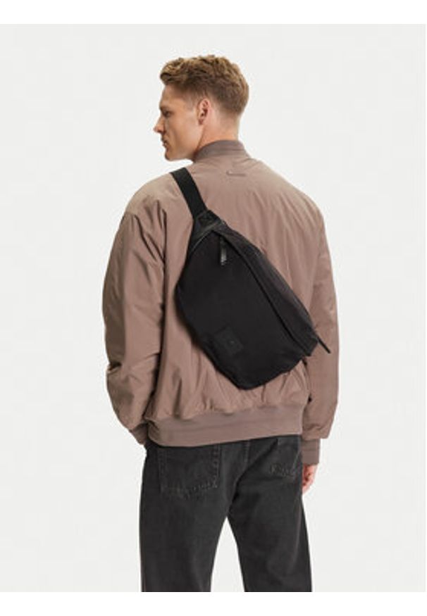 Calvin Klein Jeans Saszetka nerka Metro Nylon Oversized Waistbag LV04G3088G Czarny. Kolor: czarny. Materiał: materiał