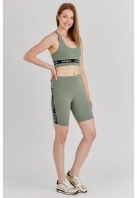 Guess - GUESS Zielone krótkie legginsy damskie z lampasami, Rozmiar S. Kolor: zielony. Materiał: bawełna. Długość: krótkie