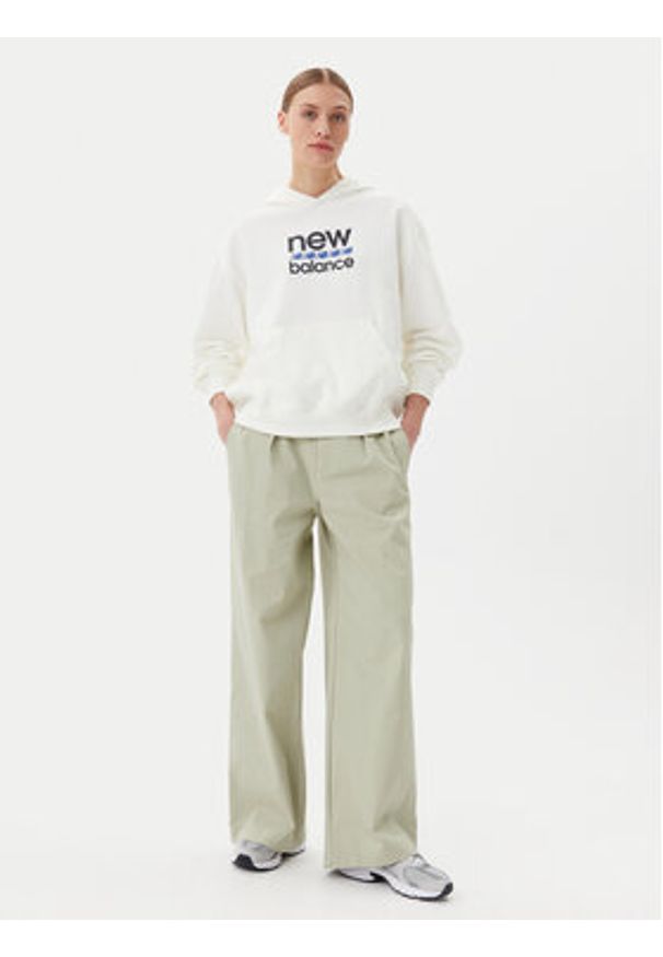 New Balance Spodnie materiałowe Boylston WP51538 Zielony Relaxed Fit. Kolor: zielony. Materiał: bawełna