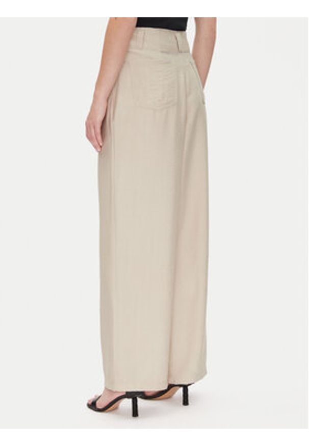 DKNY Spodnie materiałowe P41KTR48 Beżowy Loose Fit. Kolor: beżowy. Materiał: syntetyk