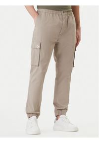 Calvin Klein Jeans Joggery Comfort LV04RD608G Beżowy Skinny Fit. Kolor: beżowy. Materiał: bawełna #1