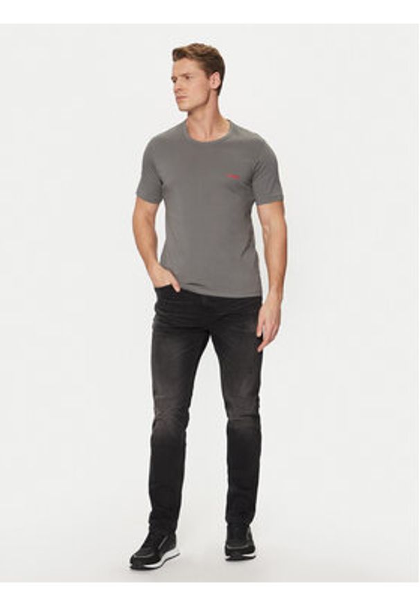 Hugo - HUGO Jeansy 50530597 Czarny Slim Fit. Kolor: czarny