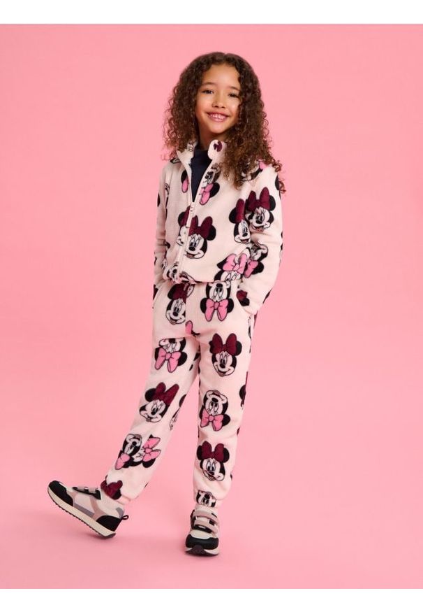 Sinsay - Polarowe spodnie Minnie Mouse - różowy. Kolor: różowy. Materiał: polar. Wzór: motyw z bajki