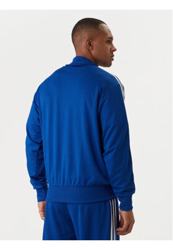 Adidas - adidas Bluza adicolor Firebird KE0790 Niebieski Loose Fit. Kolor: niebieski. Materiał: syntetyk