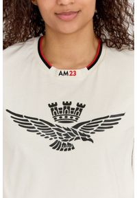 Aeronautica Militare - AERONAUTICA MILITARE Kremowy bawełniany luźny t-shirt damski z wypukłym orłem Comfort Fit, Rozmiar XS. Kolor: beżowy. Materiał: bawełna #4