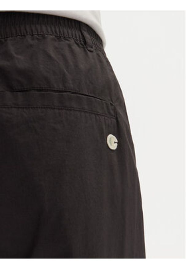 Champion Spodnie dresowe 220415 Czarny Loose Fit. Kolor: czarny. Materiał: bawełna