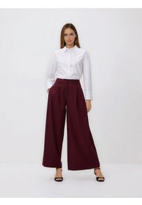 Reserved - Spodnie z szerokimi nogawkami - bordowy. Kolor: czerwony. Materiał: dzianina, wiskoza #1