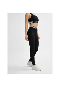 Damskie bawełniane legginsy o średnim kroju Hummel TE Maja. Kolor: czarny. Materiał: bawełna. Sport: fitness