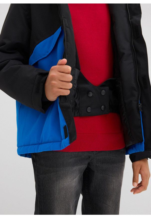 bonprix - Wodoodporna kurtka narciarska na ciepłej podszewce. Kolor: czarny