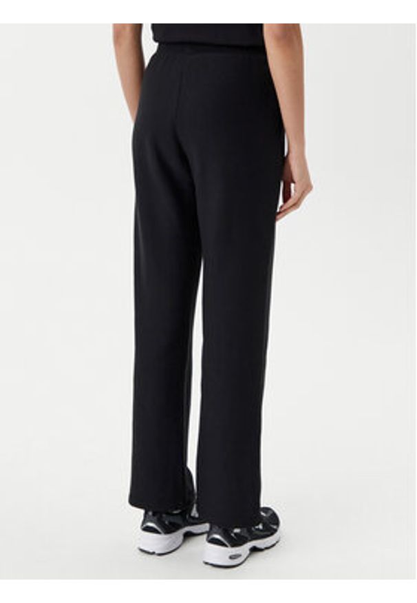 Champion Spodnie dresowe 117983 Czarny Slim Fit. Kolor: czarny. Materiał: bawełna