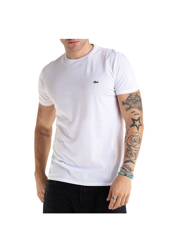 Koszulka Lacoste Crew Neck Pime Cotton Jersey TH6709-001 - biała. Kolor: biały. Materiał: jersey. Długość rękawa: krótki rękaw. Długość: krótkie. Wzór: aplikacja