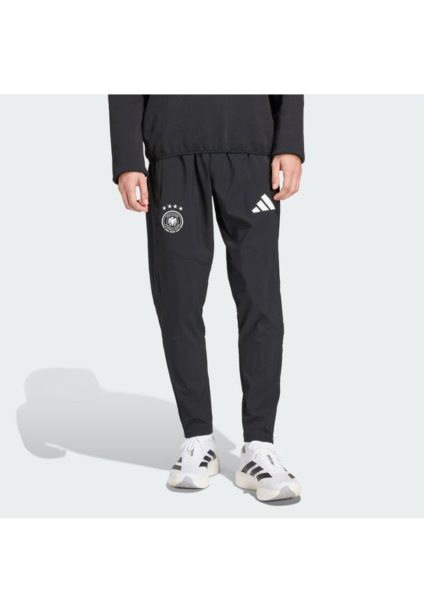 Adidas - Spodnie Germany Tiro Travel. Kolor: czarny. Materiał: dresówka. Sport: piłka nożna